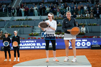 05/05/2024 - Cristina Bucsa and Sara Sorribes of Spain celebrate with the winners trophy after winning the Doubles Final against Laura Siegemund of Germany and Barbora Krejcikova of Czech Republic during the Mutua Madrid Open 2024, ATP Masters 1000 and WTA 1000, tennis tournament on May 5, 2024 at Caja Magica in Madrid, Spain - TENNIS - MUTUA MADRID OPEN 2024 - INTERNAZIONALI - TENNIS