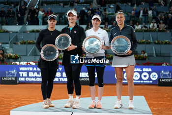 05/05/2024 - Cristina Bucsa and Sara Sorribes of Spain celebrate with the winners trophy after winning the Doubles Final against Laura Siegemund of Germany and Barbora Krejcikova of Czech Republic during the Mutua Madrid Open 2024, ATP Masters 1000 and WTA 1000, tennis tournament on May 5, 2024 at Caja Magica in Madrid, Spain - TENNIS - MUTUA MADRID OPEN 2024 - INTERNAZIONALI - TENNIS