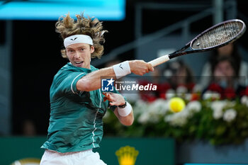 2024-05-05 - Andrey Rublev of Russia in action against Felix Auger-Aliassime of Canada during the Mutua Madrid Open 2024, ATP Masters 1000 and WTA 1000, tennis tournament on May 5, 2024 at Caja Magica in Madrid, Spain - TENNIS - MUTUA MADRID OPEN 2024 - INTERNATIONALS - TENNIS