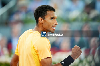 2024-05-05 - Felix Auger-Aliassime of Canada in action against Andrey Rublev of Russia during the Mutua Madrid Open 2024, ATP Masters 1000 and WTA 1000, tennis tournament on May 5, 2024 at Caja Magica in Madrid, Spain - TENNIS - MUTUA MADRID OPEN 2024 - INTERNATIONALS - TENNIS