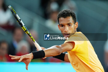 05/05/2024 - Felix Auger-Aliassime of Canada in action against Andrey Rublev of Russia during the Mutua Madrid Open 2024, ATP Masters 1000 and WTA 1000, tennis tournament on May 5, 2024 at Caja Magica in Madrid, Spain - TENNIS - MUTUA MADRID OPEN 2024 - INTERNAZIONALI - TENNIS