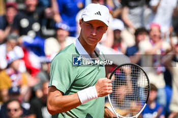 2024-05-20 - Gabriel DEBRU of France celebrates his point during first qualifying day of Roland-Garros 2024, ATP and WTA Grand Slam tennis tournament on May 20, 2024 at Roland-Garros stadium in Paris, France - TENNIS - ROLAND GARROS 2024 - PREVIEWS - INTERNATIONALS - TENNIS