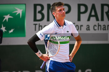 2024-05-20 - Manuel GUINARD of France looks dejected during first qualifying day of Roland-Garros 2024, ATP and WTA Grand Slam tennis tournament on May 20, 2024 at Roland-Garros stadium in Paris, France - TENNIS - ROLAND GARROS 2024 - PREVIEWS - INTERNATIONALS - TENNIS