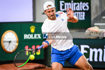 2024-05-20 - Lucas POUILLE of France during first qualifying day of Roland-Garros 2024, ATP and WTA Grand Slam tennis tournament on May 20, 2024 at Roland-Garros stadium in Paris, France - TENNIS - ROLAND GARROS 2024 - PREVIEWS - INTERNATIONALS - TENNIS