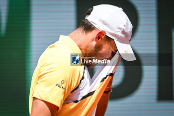 2024-05-20 - Dominic THIEM of Austria looks dejected during first qualifying day of Roland-Garros 2024, ATP and WTA Grand Slam tennis tournament on May 20, 2024 at Roland-Garros stadium in Paris, France - TENNIS - ROLAND GARROS 2024 - PREVIEWS - INTERNATIONALS - TENNIS