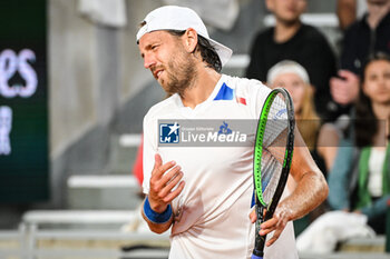 2024-05-20 - Lucas POUILLE of France looks dejected during first qualifying day of Roland-Garros 2024, ATP and WTA Grand Slam tennis tournament on May 20, 2024 at Roland-Garros stadium in Paris, France - TENNIS - ROLAND GARROS 2024 - PREVIEWS - INTERNATIONALS - TENNIS