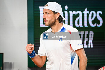 2024-05-20 - Lucas POUILLE of France celebrates his point during first qualifying day of Roland-Garros 2024, ATP and WTA Grand Slam tennis tournament on May 20, 2024 at Roland-Garros stadium in Paris, France - TENNIS - ROLAND GARROS 2024 - PREVIEWS - INTERNATIONALS - TENNIS