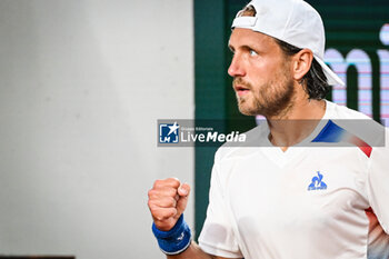 2024-05-20 - Lucas POUILLE of France celebrates his point during first qualifying day of Roland-Garros 2024, ATP and WTA Grand Slam tennis tournament on May 20, 2024 at Roland-Garros stadium in Paris, France - TENNIS - ROLAND GARROS 2024 - PREVIEWS - INTERNATIONALS - TENNIS