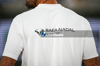 2024-05-20 - Illustration of a Rafa Nadal Academy t-shirt during a training session of Roland-Garros 2024, ATP and WTA Grand Slam tennis tournament on May 20, 2024 at Roland-Garros stadium in Paris, France - TENNIS - ROLAND GARROS 2024 - PREVIEWS - INTERNATIONALS - TENNIS