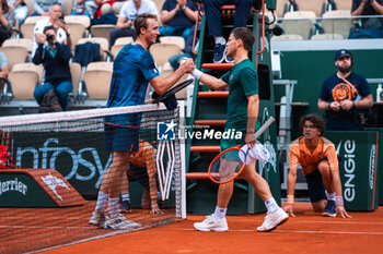 2024-05-21 - Diego SCHWARTZMAN (ARG) and Lukas NEUMAYER (AUT) during the Roland-Garros 2024, ATP and WTA Grand Slam tennis tournament on May 21, 2024 at Roland-Garros stadium in Paris, France - TENNIS - ROLAND GARROS 2024 - PREVIEW - INTERNATIONALS - TENNIS