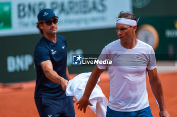 2024-05-21 - Rafael NADAL (ESP) and Carlos MOYA (ESP) during the Roland-Garros 2024, ATP and WTA Grand Slam tennis tournament on May 21, 2024 at Roland-Garros stadium in Paris, France - TENNIS - ROLAND GARROS 2024 - PREVIEW - INTERNATIONALS - TENNIS