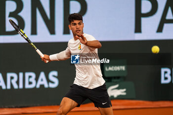 2024-05-21 - Carlos ALCARAZ (ESP) during the Roland-Garros 2024, ATP and WTA Grand Slam tennis tournament on May 22, 2024 at Roland-Garros stadium in Paris, France - TENNIS - ROLAND GARROS 2024 - PREVIEW - INTERNATIONALS - TENNIS