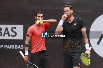 2024-05-22 - Yuki BHAMBRI (IND) and Albano OLIVETTI (FRA) during the Open Parc Auvergne-Rhone-Alpes Lyon 2024, ATP 250 Tennis tournament on May 22, 2024 at Parc de la Tete d'Or in Lyon, France - TENNIS - OPEN PARC LYON 2024 - INTERNATIONALS - TENNIS