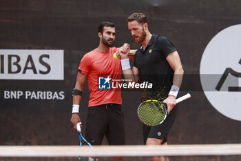 2024-05-22 - Yuki BHAMBRI (IND) and Albano OLIVETTI (FRA) during the Open Parc Auvergne-Rhone-Alpes Lyon 2024, ATP 250 Tennis tournament on May 22, 2024 at Parc de la Tete d'Or in Lyon, France - TENNIS - OPEN PARC LYON 2024 - INTERNATIONALS - TENNIS