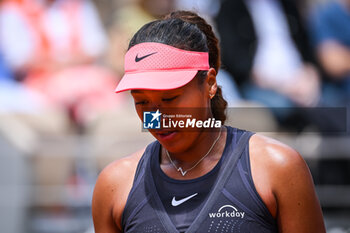 2024-05-26 - Naomi OSAKA of Japan during the first day of Roland-Garros 2024, ATP and WTA Grand Slam tennis tournament on May 26, 2024 at Roland-Garros stadium in Paris, France - TENNIS - ROLAND GARROS 2024 - 26/05 - INTERNATIONALS - TENNIS