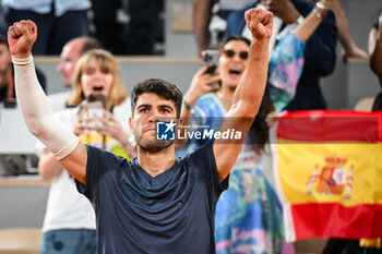 2024-05-26 - Carlos ALCARAZ of Spain celebrates his victory during the first day of Roland-Garros 2024, ATP and WTA Grand Slam tennis tournament on May 26, 2024 at Roland-Garros stadium in Paris, France - TENNIS - ROLAND GARROS 2024 - 26/05 - INTERNATIONALS - TENNIS