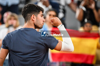 2024-05-26 - Carlos ALCARAZ of Spain celebrates his victory during the first day of Roland-Garros 2024, ATP and WTA Grand Slam tennis tournament on May 26, 2024 at Roland-Garros stadium in Paris, France - TENNIS - ROLAND GARROS 2024 - 26/05 - INTERNATIONALS - TENNIS