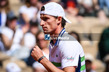 2024-05-26 - Ugo HUMBERT of France celebrates his point during the first day of Roland-Garros 2024, ATP and WTA Grand Slam tennis tournament on May 26, 2024 at Roland-Garros stadium in Paris, France - TENNIS - ROLAND GARROS 2024 - 26/05 - INTERNATIONALS - TENNIS