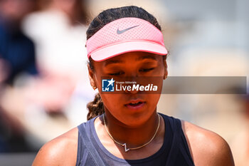 2024-05-26 - Naomi OSAKA of Japan during the first day of Roland-Garros 2024, ATP and WTA Grand Slam tennis tournament on May 26, 2024 at Roland-Garros stadium in Paris, France - TENNIS - ROLAND GARROS 2024 - 26/05 - INTERNATIONALS - TENNIS