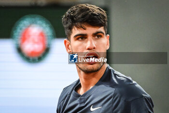 2024-05-26 - Carlos ALCARAZ of Spain during the first day of Roland-Garros 2024, ATP and WTA Grand Slam tennis tournament on May 26, 2024 at Roland-Garros stadium in Paris, France - TENNIS - ROLAND GARROS 2024 - 26/05 - INTERNATIONALS - TENNIS