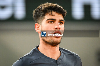 2024-05-26 - Carlos ALCARAZ of Spain during the first day of Roland-Garros 2024, ATP and WTA Grand Slam tennis tournament on May 26, 2024 at Roland-Garros stadium in Paris, France - TENNIS - ROLAND GARROS 2024 - 26/05 - INTERNATIONALS - TENNIS