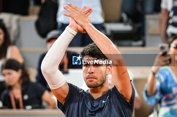 2024-05-26 - Carlos ALCARAZ of Spain celebrates his victory during the first day of Roland-Garros 2024, ATP and WTA Grand Slam tennis tournament on May 26, 2024 at Roland-Garros stadium in Paris, France - TENNIS - ROLAND GARROS 2024 - 26/05 - INTERNATIONALS - TENNIS