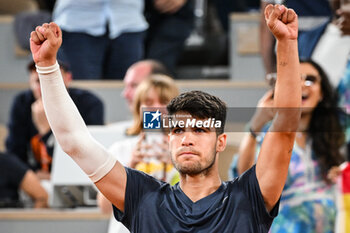 2024-05-26 - Carlos ALCARAZ of Spain celebrates his victory during the first day of Roland-Garros 2024, ATP and WTA Grand Slam tennis tournament on May 26, 2024 at Roland-Garros stadium in Paris, France - TENNIS - ROLAND GARROS 2024 - 26/05 - INTERNATIONALS - TENNIS