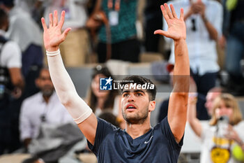 2024-05-26 - Carlos ALCARAZ of Spain celebrates his victory during the first day of Roland-Garros 2024, ATP and WTA Grand Slam tennis tournament on May 26, 2024 at Roland-Garros stadium in Paris, France - TENNIS - ROLAND GARROS 2024 - 26/05 - INTERNATIONALS - TENNIS