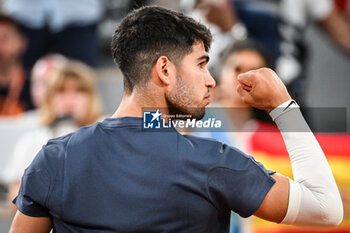 2024-05-26 - Carlos ALCARAZ of Spain celebrates his victory during the first day of Roland-Garros 2024, ATP and WTA Grand Slam tennis tournament on May 26, 2024 at Roland-Garros stadium in Paris, France - TENNIS - ROLAND GARROS 2024 - 26/05 - INTERNATIONALS - TENNIS