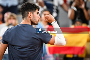 2024-05-26 - Carlos ALCARAZ of Spain celebrates his victory during the first day of Roland-Garros 2024, ATP and WTA Grand Slam tennis tournament on May 26, 2024 at Roland-Garros stadium in Paris, France - TENNIS - ROLAND GARROS 2024 - 26/05 - INTERNATIONALS - TENNIS