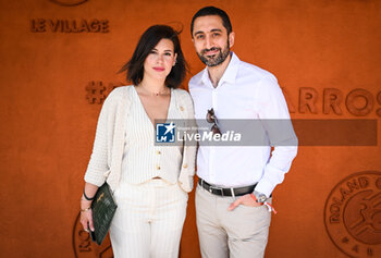 2024-05-26 - Jimmy MOHAMED with his wife Souailla MOHAMED during the first day of Roland-Garros 2024, ATP and WTA Grand Slam tennis tournament on May 26, 2024 at Roland-Garros stadium in Paris, France - TENNIS - ROLAND GARROS 2024 - 26/05 - INTERNATIONALS - TENNIS