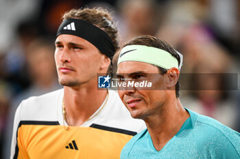 2024-05-27 - Alexander ZVEREV of Germany and Rafael NADAL of Spain during the second day of Roland-Garros 2024, ATP and WTA Grand Slam tennis tournament on May 27, 2024 at Roland-Garros stadium in Paris, France - TENNIS - ROLAND GARROS 2024 - 27/05 - INTERNATIONALS - TENNIS