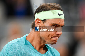 2024-05-27 - Rafael NADAL of Spain looks dejected during the second day of Roland-Garros 2024, ATP and WTA Grand Slam tennis tournament on May 27, 2024 at Roland-Garros stadium in Paris, France - TENNIS - ROLAND GARROS 2024 - 27/05 - INTERNATIONALS - TENNIS