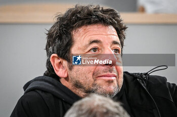 2024-05-27 - Patrick BRUEL during the second day of Roland-Garros 2024, ATP and WTA Grand Slam tennis tournament on May 27, 2024 at Roland-Garros stadium in Paris, France - TENNIS - ROLAND GARROS 2024 - 27/05 - INTERNATIONALS - TENNIS