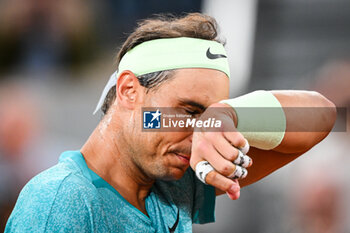 2024-05-27 - Rafael NADAL of Spain looks dejected during the second day of Roland-Garros 2024, ATP and WTA Grand Slam tennis tournament on May 27, 2024 at Roland-Garros stadium in Paris, France - TENNIS - ROLAND GARROS 2024 - 27/05 - INTERNATIONALS - TENNIS