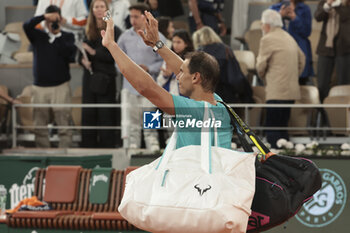 2024-05-27 - Rafael Nadal of Spain salutes the crowd following his first round match defeat against Alexander Zverev aka Sascha Zverev of Germany on day 2 of the 2024 French Open, Roland-Garros 2024, Grand Slam tennis tournament on May 27, 2024 at Roland-Garros stadium in Paris, France - TENNIS - ROLAND GARROS 2024 - 27/05 - INTERNATIONALS - TENNIS