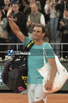 2024-05-27 - Rafael Nadal of Spain salutes the crowd following his first round match defeat against Alexander Zverev aka Sascha Zverev of Germany on day 2 of the 2024 French Open, Roland-Garros 2024, Grand Slam tennis tournament on May 27, 2024 at Roland-Garros stadium in Paris, France - TENNIS - ROLAND GARROS 2024 - 27/05 - INTERNATIONALS - TENNIS