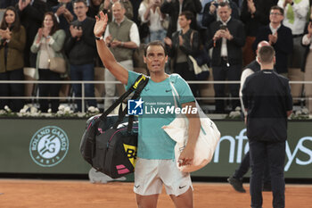 2024-05-27 - Rafael Nadal of Spain salutes the crowd following his first round match defeat against Alexander Zverev aka Sascha Zverev of Germany on day 2 of the 2024 French Open, Roland-Garros 2024, Grand Slam tennis tournament on May 27, 2024 at Roland-Garros stadium in Paris, France - TENNIS - ROLAND GARROS 2024 - 27/05 - INTERNATIONALS - TENNIS