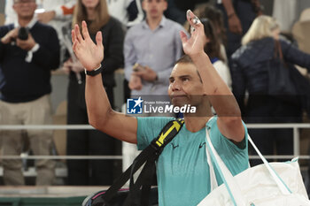 2024-05-27 - Rafael Nadal of Spain salutes the crowd following his first round match defeat against Alexander Zverev aka Sascha Zverev of Germany on day 2 of the 2024 French Open, Roland-Garros 2024, Grand Slam tennis tournament on May 27, 2024 at Roland-Garros stadium in Paris, France - TENNIS - ROLAND GARROS 2024 - 27/05 - INTERNATIONALS - TENNIS