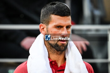 2024-05-28 - Novak DJOKOVIC of Serbia during the third day of Roland-Garros 2024, ATP and WTA Grand Slam tennis tournament on May 28, 2024 at Roland-Garros stadium in Paris, France - TENNIS - ROLAND GARROS 2024 - 28/05 - INTERNATIONALS - TENNIS