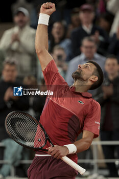 2024-05-28 - Novak Djokovic of Serbia celebrates his first round victory during day 3 of 2024 French Open, Roland-Garros 2024, Grand Slam tennis tournament on May 28, 2024 at Roland-Garros stadium in Paris, France - TENNIS - ROLAND GARROS 2024 - 28/05 - INTERNATIONALS - TENNIS