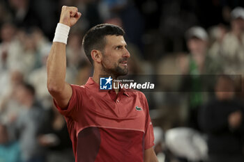 2024-05-28 - Novak Djokovic of Serbia celebrates his first round victory during day 3 of 2024 French Open, Roland-Garros 2024, Grand Slam tennis tournament on May 28, 2024 at Roland-Garros stadium in Paris, France - TENNIS - ROLAND GARROS 2024 - 28/05 - INTERNATIONALS - TENNIS