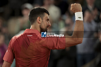 2024-05-28 - Novak Djokovic of Serbia celebrates his first round victory during day 3 of 2024 French Open, Roland-Garros 2024, Grand Slam tennis tournament on May 28, 2024 at Roland-Garros stadium in Paris, France - TENNIS - ROLAND GARROS 2024 - 28/05 - INTERNATIONALS - TENNIS