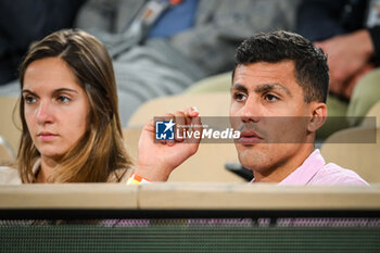 2024-05-29 - Rodrigo HERNANDEZ CASCANTE (Rodri) with his partner Laura during the fourth day of Roland-Garros 2024, ATP and WTA Grand Slam tennis tournament on May 29, 2024 at Roland-Garros stadium in Paris, France - TENNIS - ROLAND GARROS 2024 - 29/05 - INTERNATIONALS - TENNIS