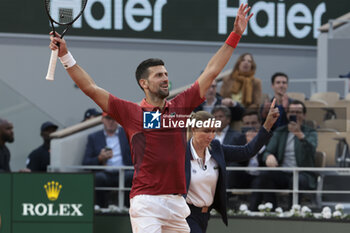 2024-06-03 - Novak Djokovic of Serbia celebrates his fourth round victory against Francisco Cerundolo of Argentina during day 9 of the 2024 French Open, Roland-Garros 2024, Grand Slam tennis tournament on June 3, 2024 at Roland-Garros stadium in Paris, France - TENNIS - ROLAND GARROS 2024 - 03/06 - INTERNATIONALS - TENNIS