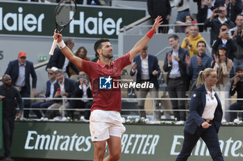 2024-06-03 - Novak Djokovic of Serbia celebrates his fourth round victory against Francisco Cerundolo of Argentina during day 9 of the 2024 French Open, Roland-Garros 2024, Grand Slam tennis tournament on June 3, 2024 at Roland-Garros stadium in Paris, France - TENNIS - ROLAND GARROS 2024 - 03/06 - INTERNATIONALS - TENNIS