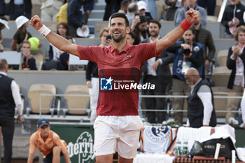 2024-06-03 - Novak Djokovic of Serbia celebrates his fourth round victory against Francisco Cerundolo of Argentina during day 9 of the 2024 French Open, Roland-Garros 2024, Grand Slam tennis tournament on June 3, 2024 at Roland-Garros stadium in Paris, France - TENNIS - ROLAND GARROS 2024 - 03/06 - INTERNATIONALS - TENNIS