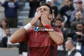 2024-06-03 - Novak Djokovic of Serbia celebrates his fourth round victory against Francisco Cerundolo of Argentina during day 9 of the 2024 French Open, Roland-Garros 2024, Grand Slam tennis tournament on June 3, 2024 at Roland-Garros stadium in Paris, France - TENNIS - ROLAND GARROS 2024 - 03/06 - INTERNATIONALS - TENNIS