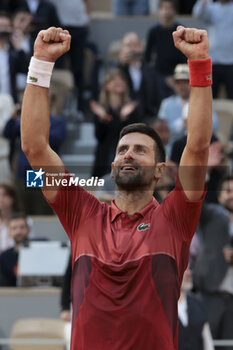 2024-06-03 - Novak Djokovic of Serbia celebrates his fourth round victory against Francisco Cerundolo of Argentina during day 9 of the 2024 French Open, Roland-Garros 2024, Grand Slam tennis tournament on June 3, 2024 at Roland-Garros stadium in Paris, France - TENNIS - ROLAND GARROS 2024 - 03/06 - INTERNATIONALS - TENNIS