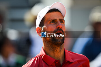 2024-06-03 - Novak DJOKOVIC of Serbia during the ninth day of Roland-Garros 2024, ATP and WTA Grand Slam tennis tournament on June 03, 2024 at Roland-Garros stadium in Paris, France - TENNIS - ROLAND GARROS 2024 - 03/06 - INTERNATIONALS - TENNIS